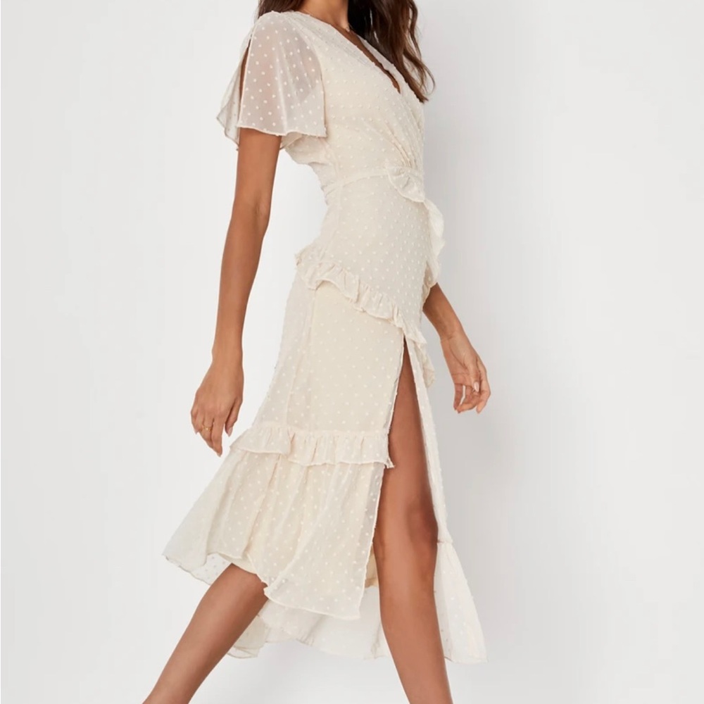 Beautiful Lulu cream ruffle dress size small. Never worn. With tags.